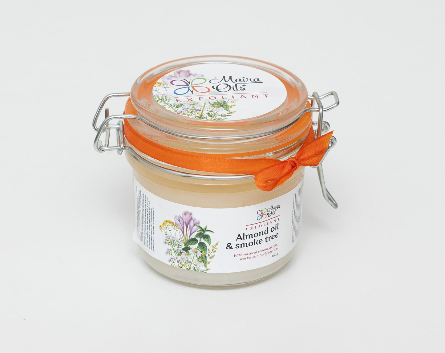 Almond scrub with sumac essential oil in a 250g glass jar with wire closure. Natural exfoliant enriched with almond oil and sumac essential oil for gentle exfoliation and hydration. Ideal for all skin types.